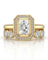 D color radiant moissanite center framed by round moissanite accents in polished 18K yellow gold | SARATTI