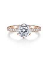 D color round moissanite center framed by pavé side stones in 18K rose gold | SARATTI