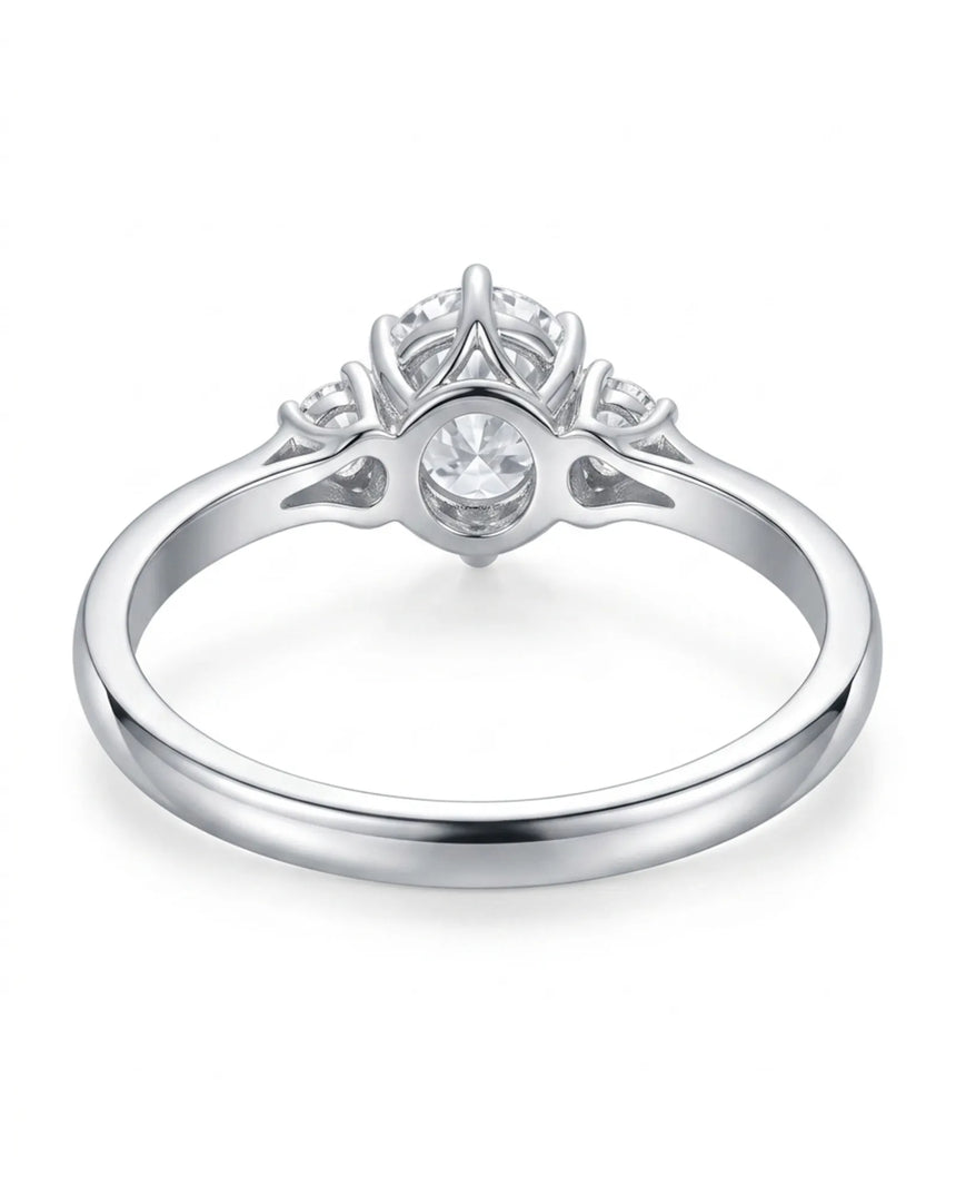 D color round moissanite center with matching side stones in enduring platinum | SARATTI