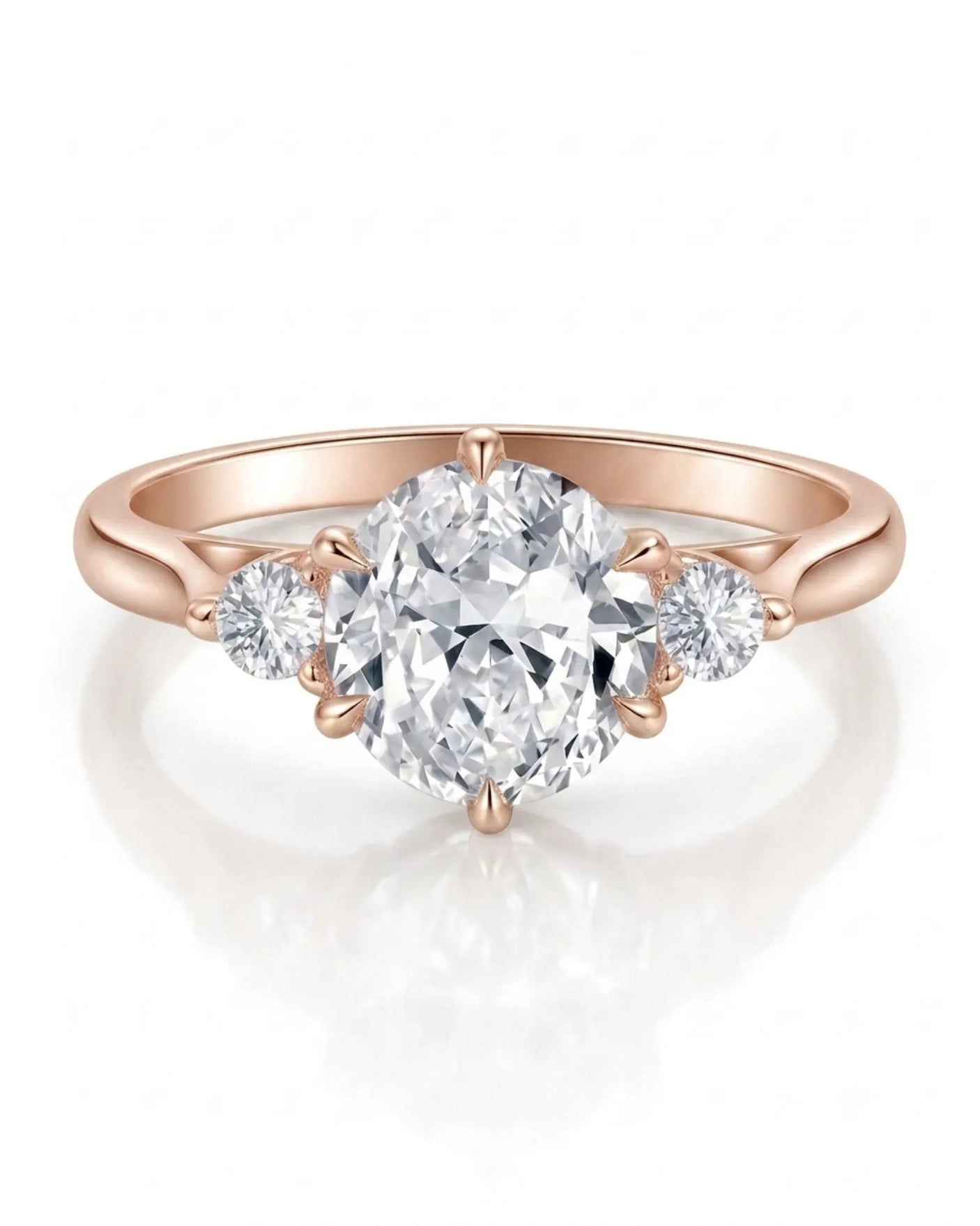 D color round moissanite center with matching side stones in rose gold | SARATTI