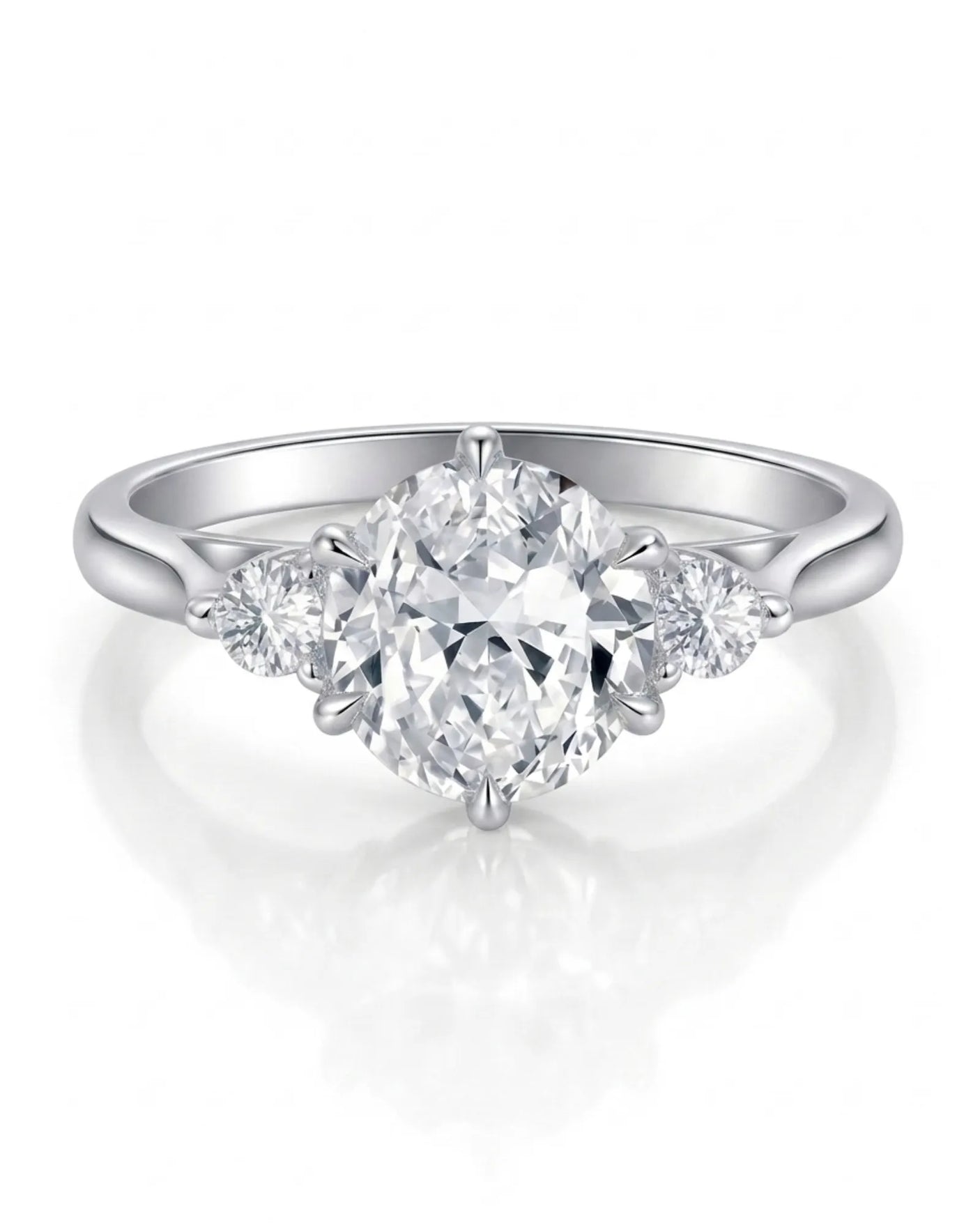 D color round moissanite center with matching side stones in white gold | SARATTI