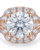 D colorless cushion moissanite framed by brilliant round stones in 18K rose gold | SARATTI
