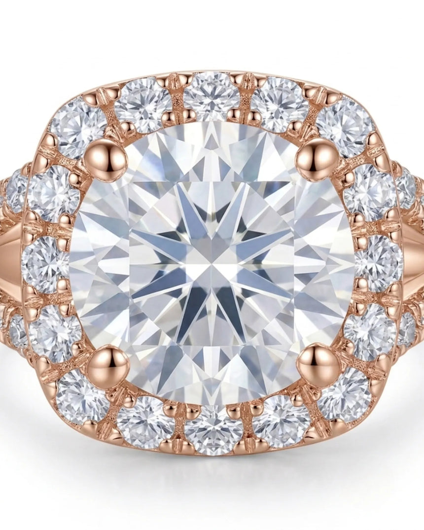 D colorless cushion moissanite framed by brilliant round stones in 18K rose gold | SARATTI