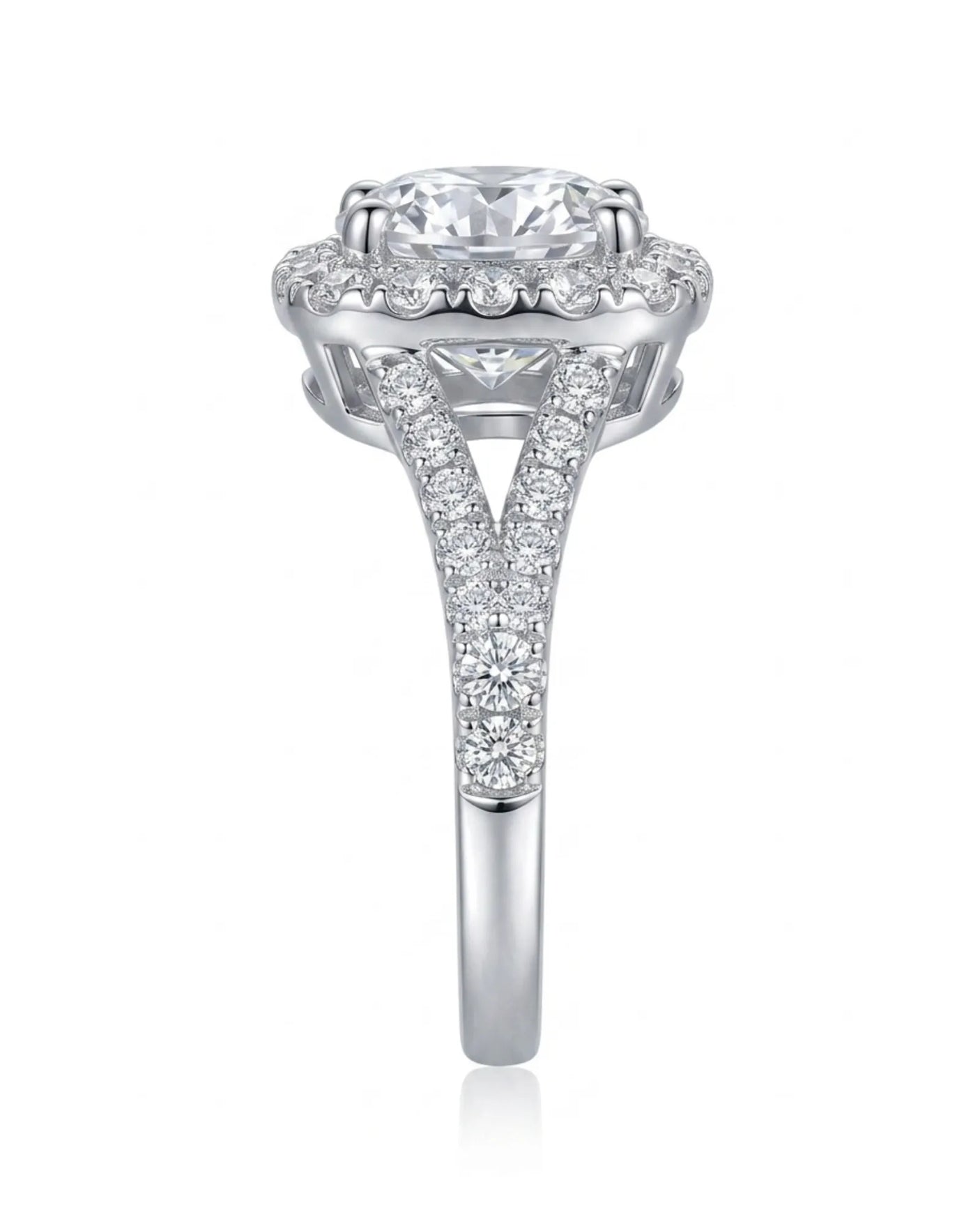 D colorless cushion moissanite framed by brilliant round stones in polished platinum | SARATTI