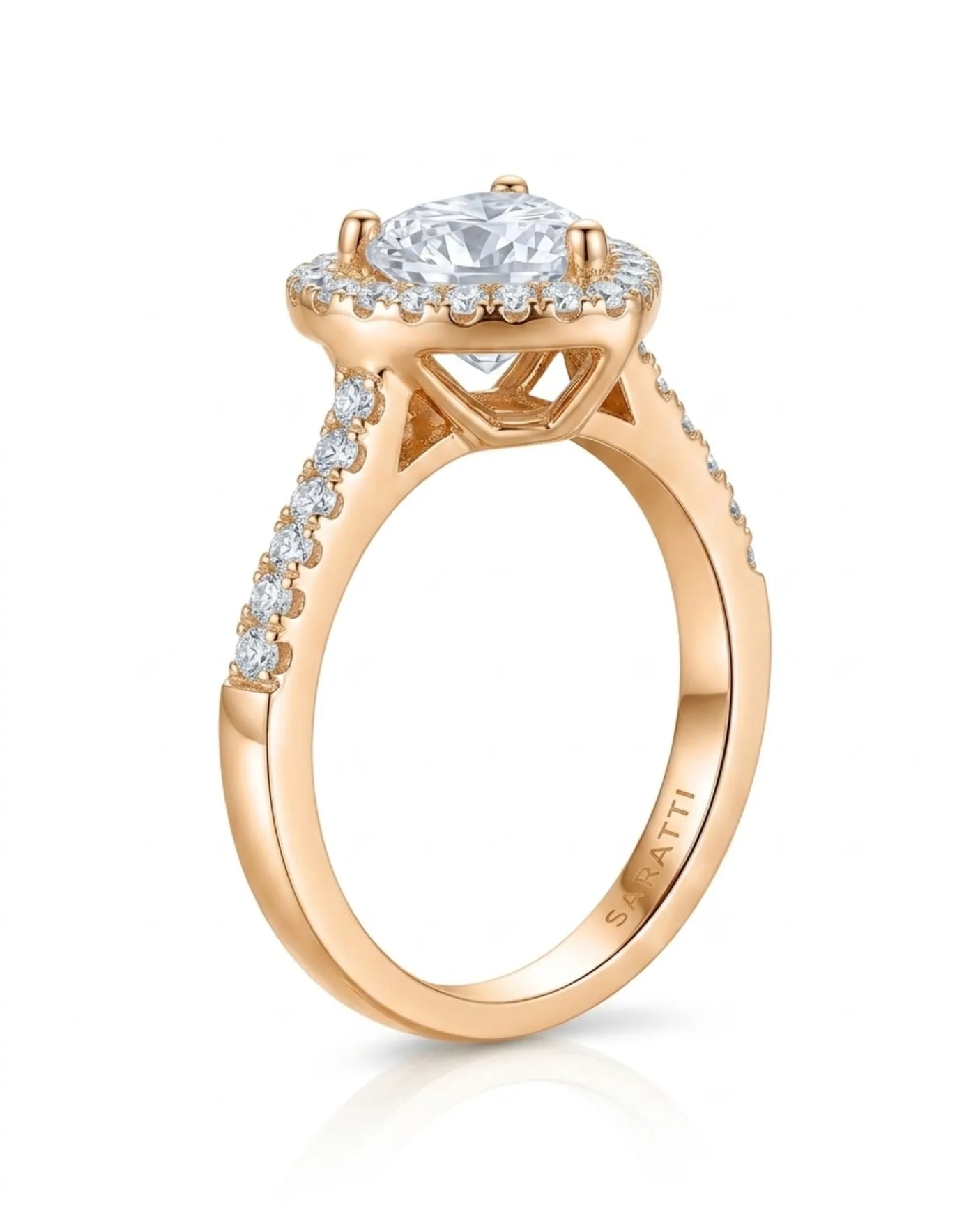 D colorless heart moissanite ring framed by round accent stones in 18K rose gold | SARATTI