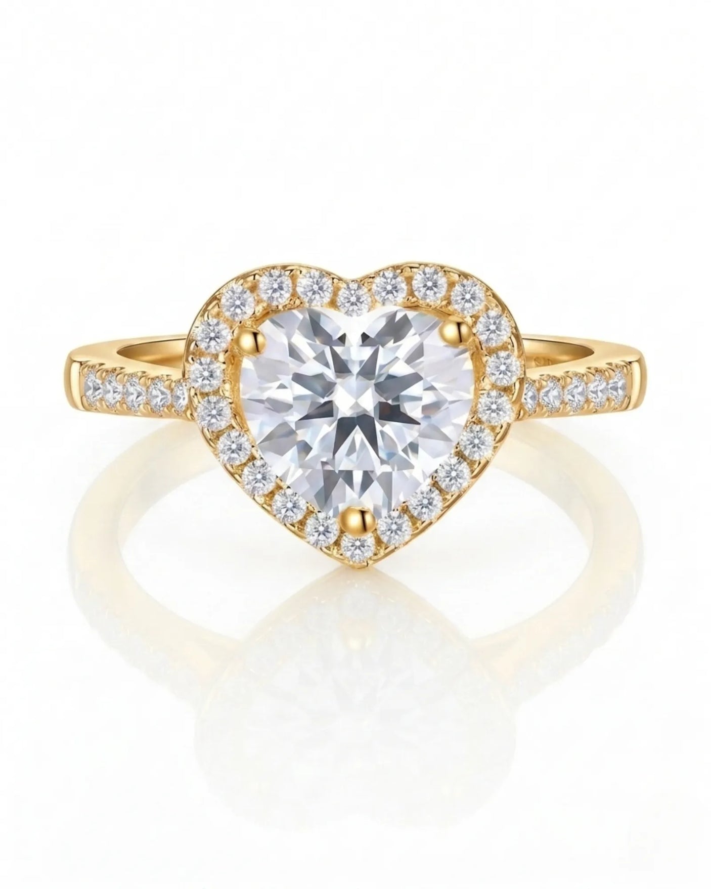 D colorless heart moissanite ring framed by round accent stones in 18K yellow gold | SARATTI