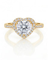 D colorless heart moissanite ring framed by round accent stones in 18K yellow gold | SARATTI