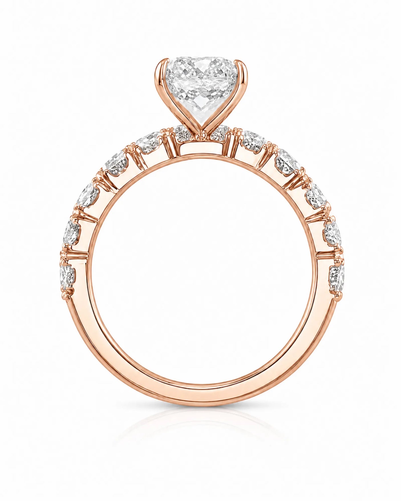 D colorless pear moissanite engagement ring with round accent stones in rose gold | SARATTI