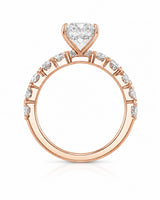 D colorless pear moissanite engagement ring with round accent stones in rose gold | SARATTI