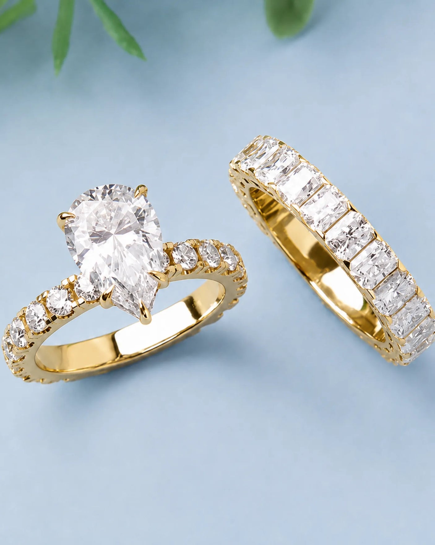 D colorless pear moissanite engagement ring with round accent stones in yellow gold | SARATTI
