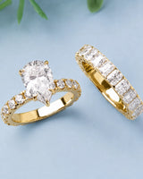 D colorless pear moissanite engagement ring with round accent stones in yellow gold | SARATTI