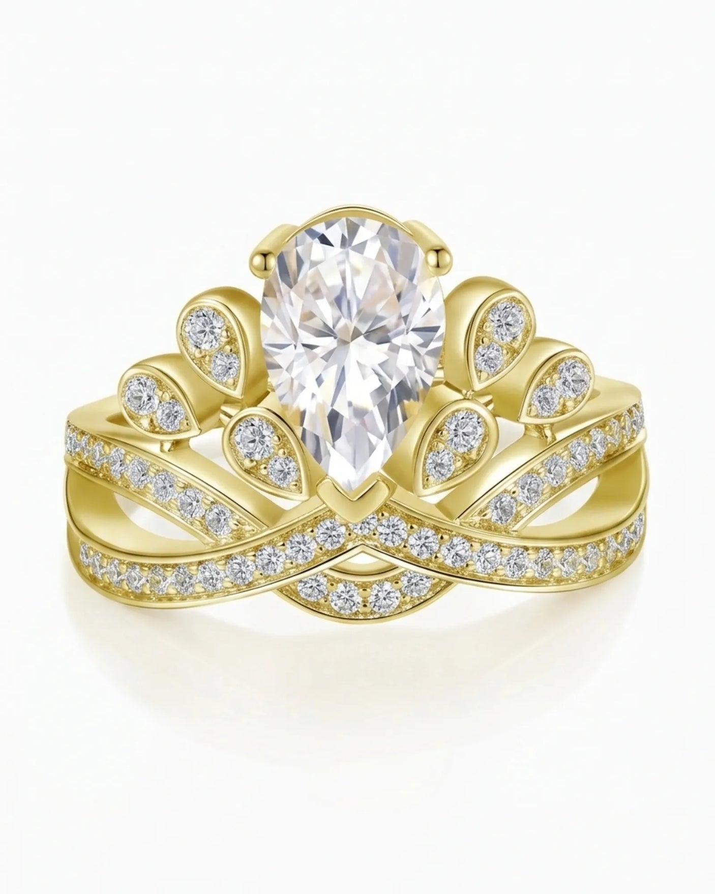 D colorless pear moissanite ring framed by round accent stones in 18K yellow gold | SARATTI
