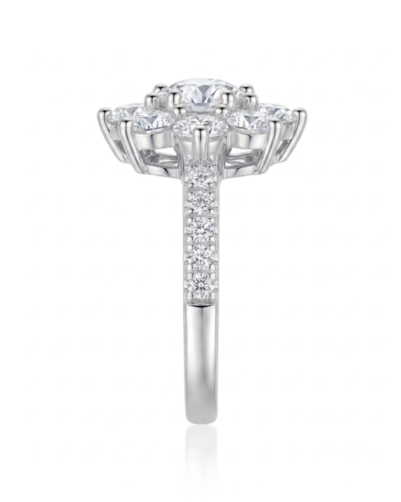 D colorless round moissanite ring framed by brilliant cluster stones in enduring platinum | SARATTI