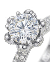 D colorless round moissanite ring with hidden halo and pavé side stones in 18K white gold | SARATTI