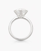 D colorless round moissanite secured in a precise six-prong platinum setting | SARATTI