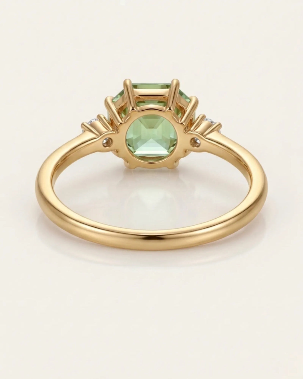 Dainty green tourmaline engagement ring with two diamonds in 18K yellow gold | SARATTI