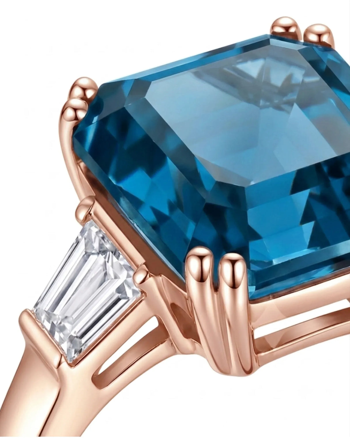 Deep London Blue topaz center framed by baguette diamond accents in polished 18K rose gold | SARATTI