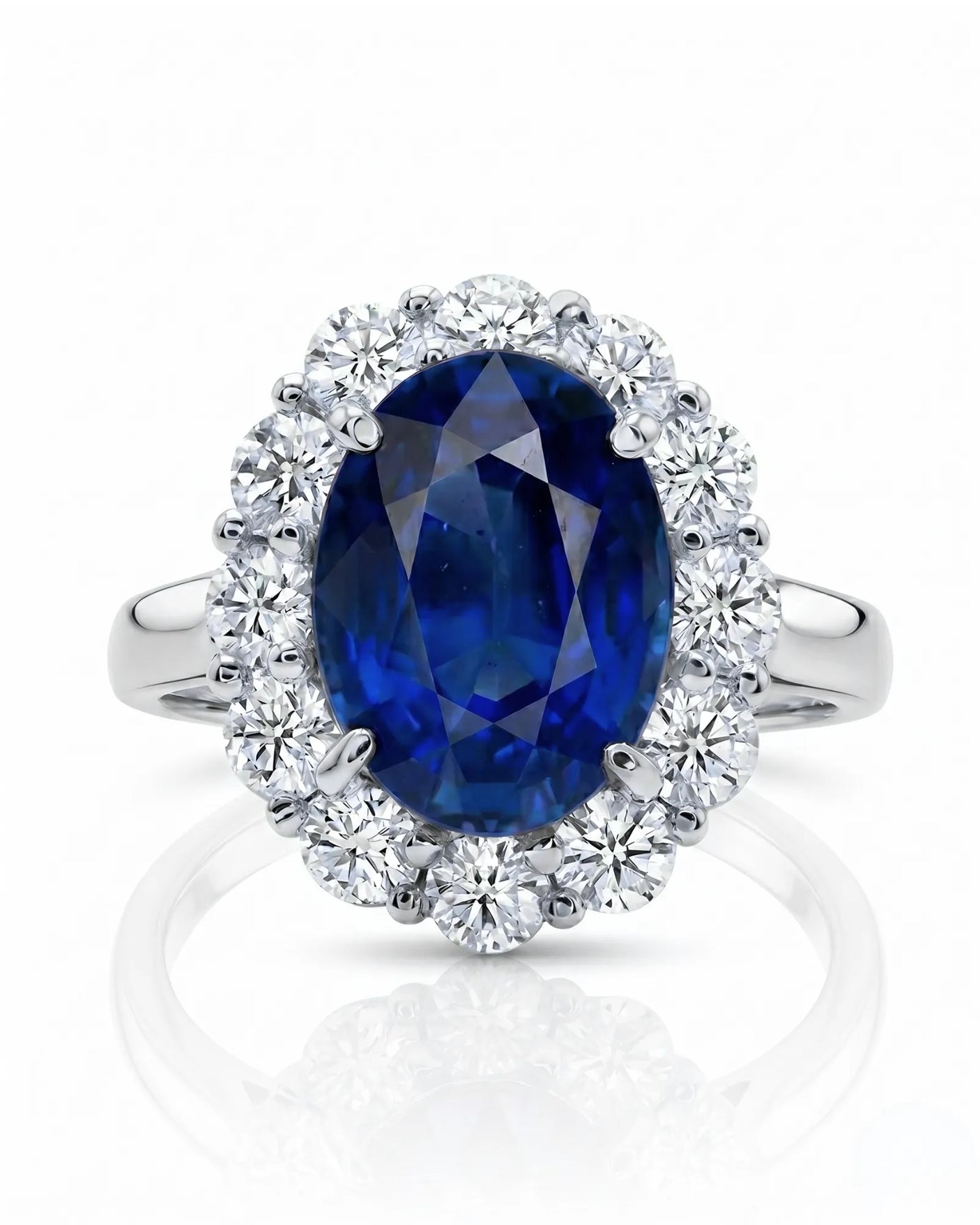 Deep blue oval sapphire ring with bright round diamonds in refined platinum | SARATTI