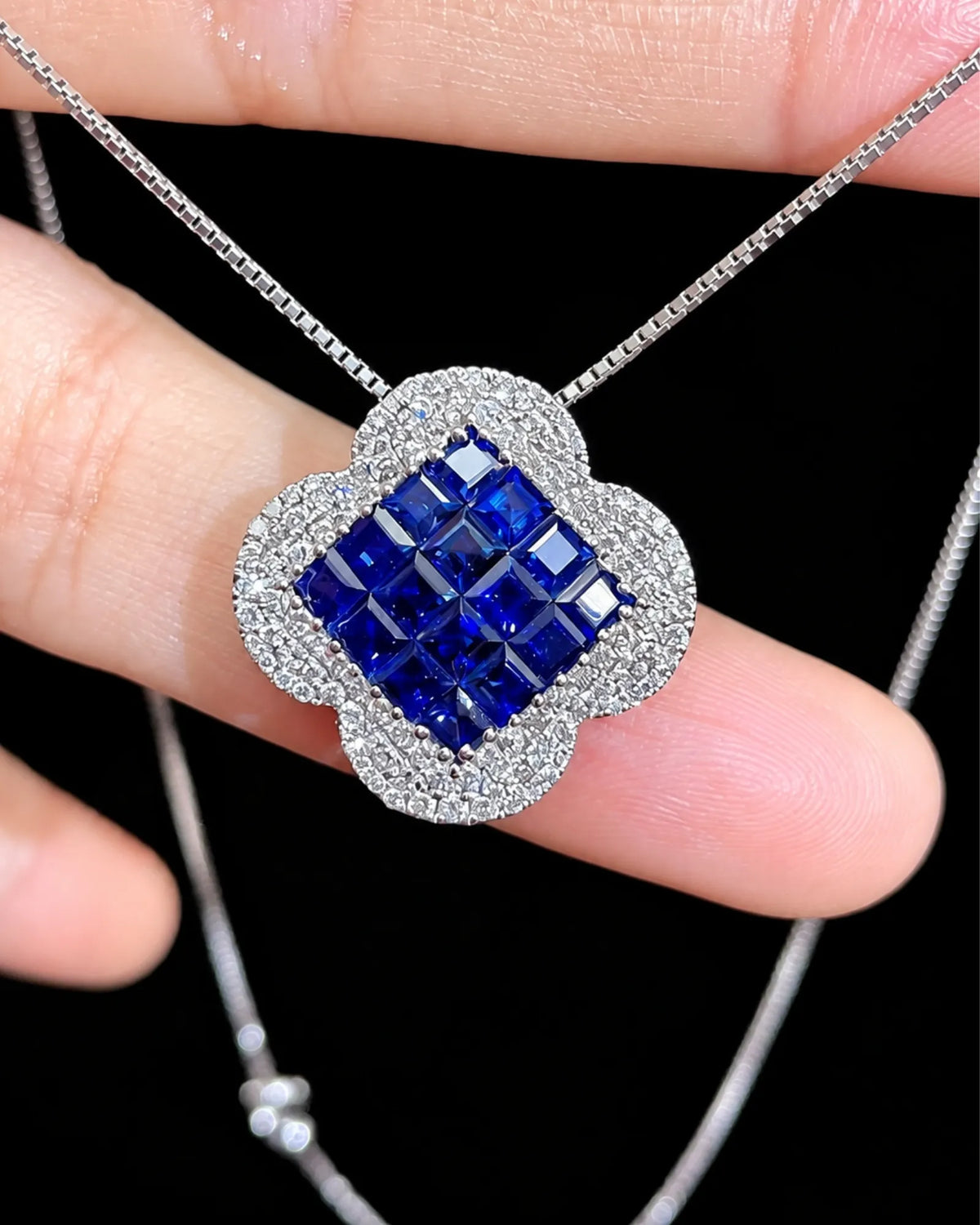 Deep blue sapphire necklace featuring a structured gemstone centre framed by brilliant diamond detailing - SARATTI