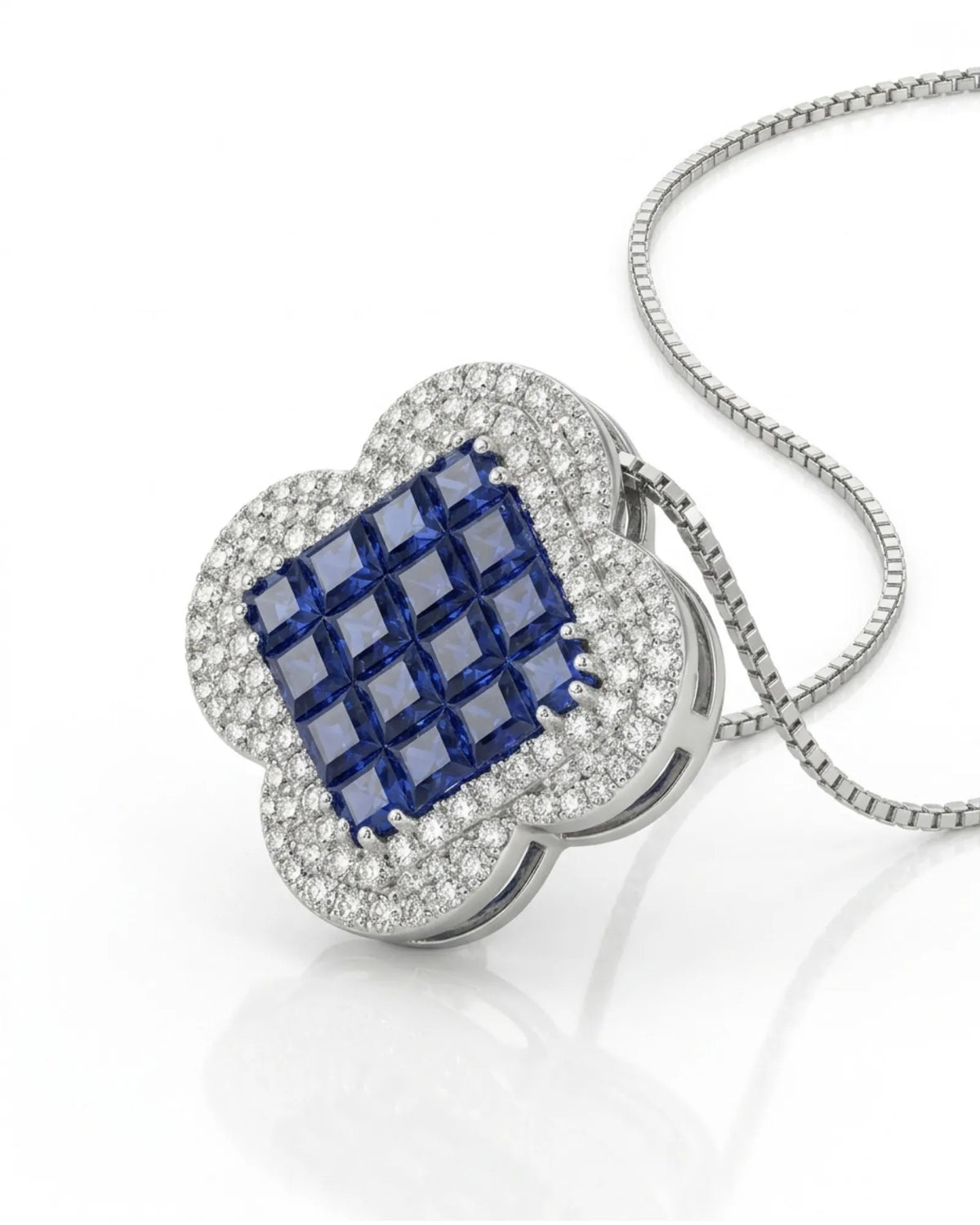 Deep blue sapphire necklace featuring a structured gemstone centre framed by brilliant diamond detailing | SARATTI
