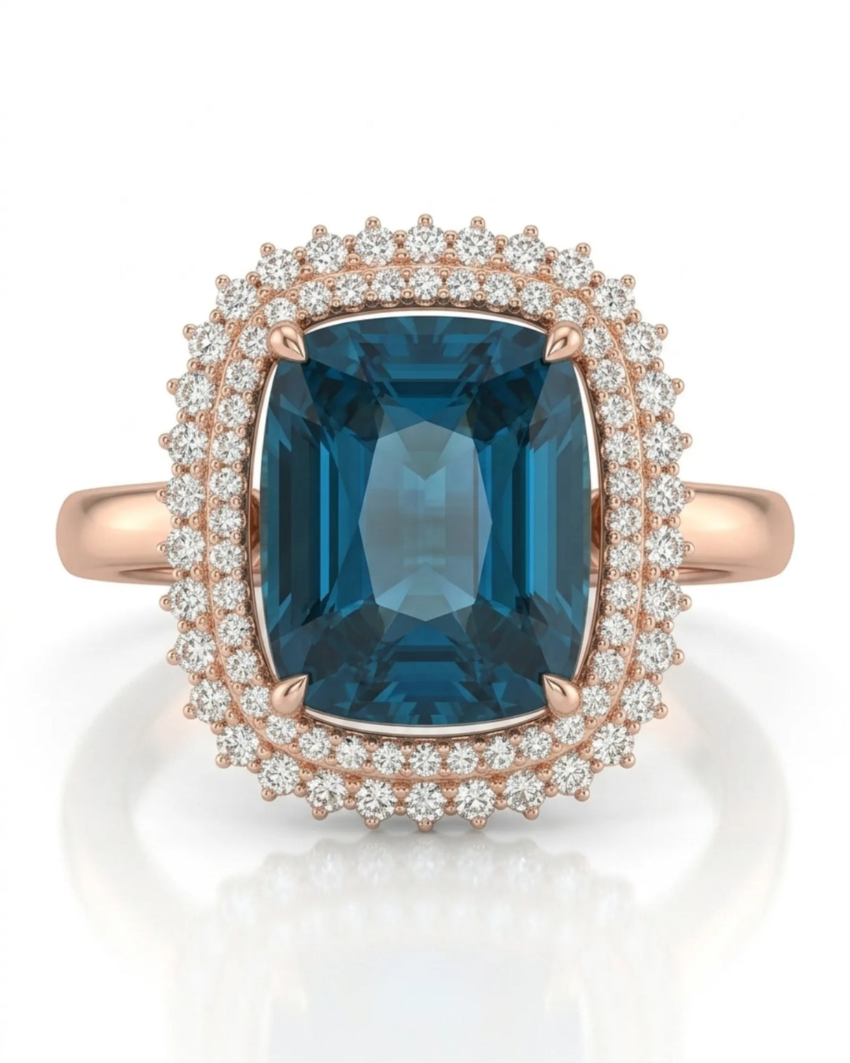 Deep blue tourmaline ring with sparkling diamond halo accents in 18K rose gold | SARATTI