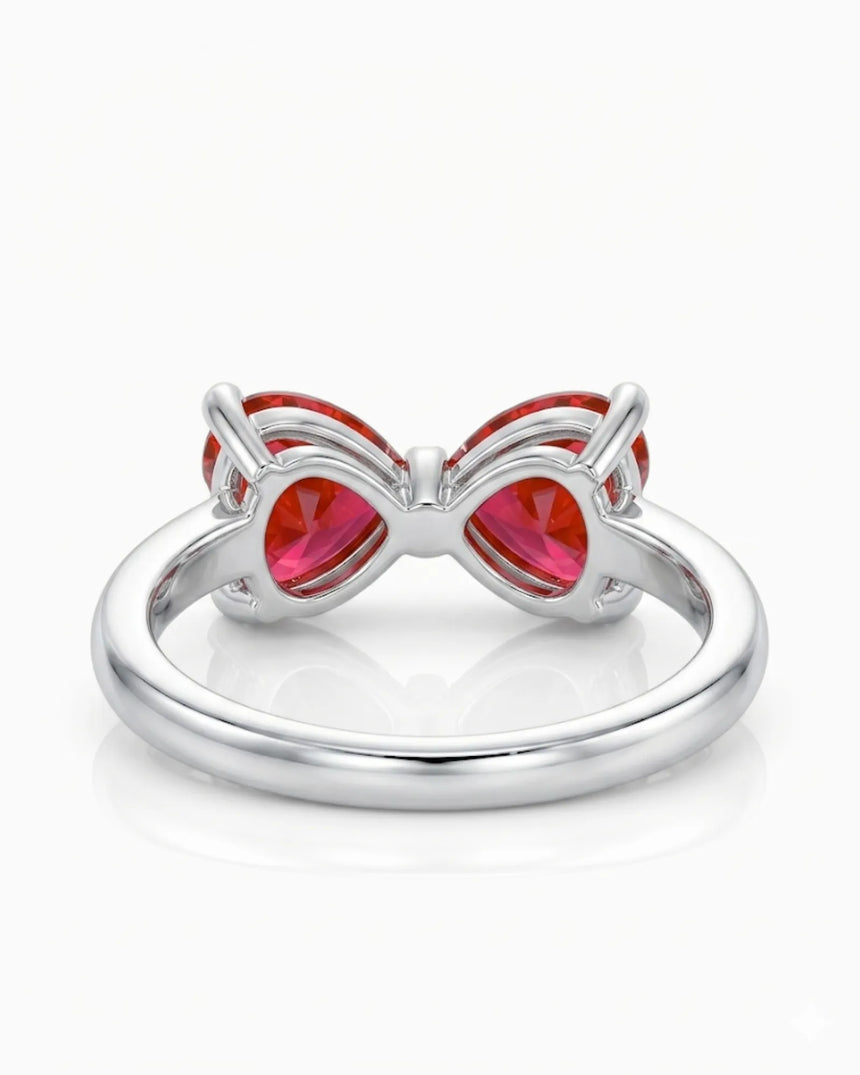 Deep red heart shaped ruby ring crafted with polished Platinum | SARATTI