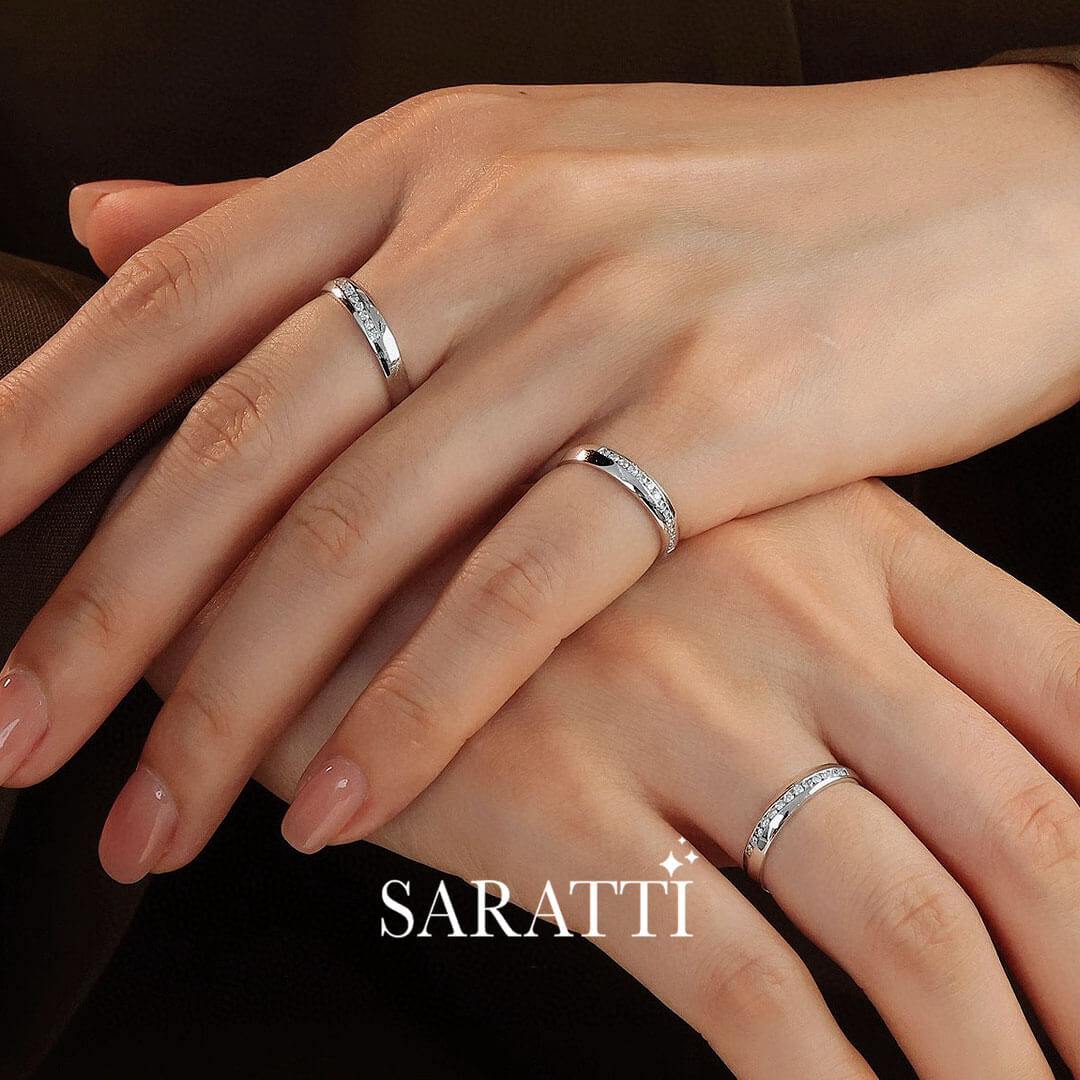 Model Wears Three White Gold Oblong Channel Set Diamond Eternity Wedding Bands | Saratti