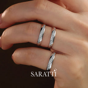 Close up shot of model stacking three White Gold Oblong Channel Set Diamond Eternity Wedding Bands | Saratti