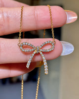 Diamond bow necklace in 18K gold | SARATTI