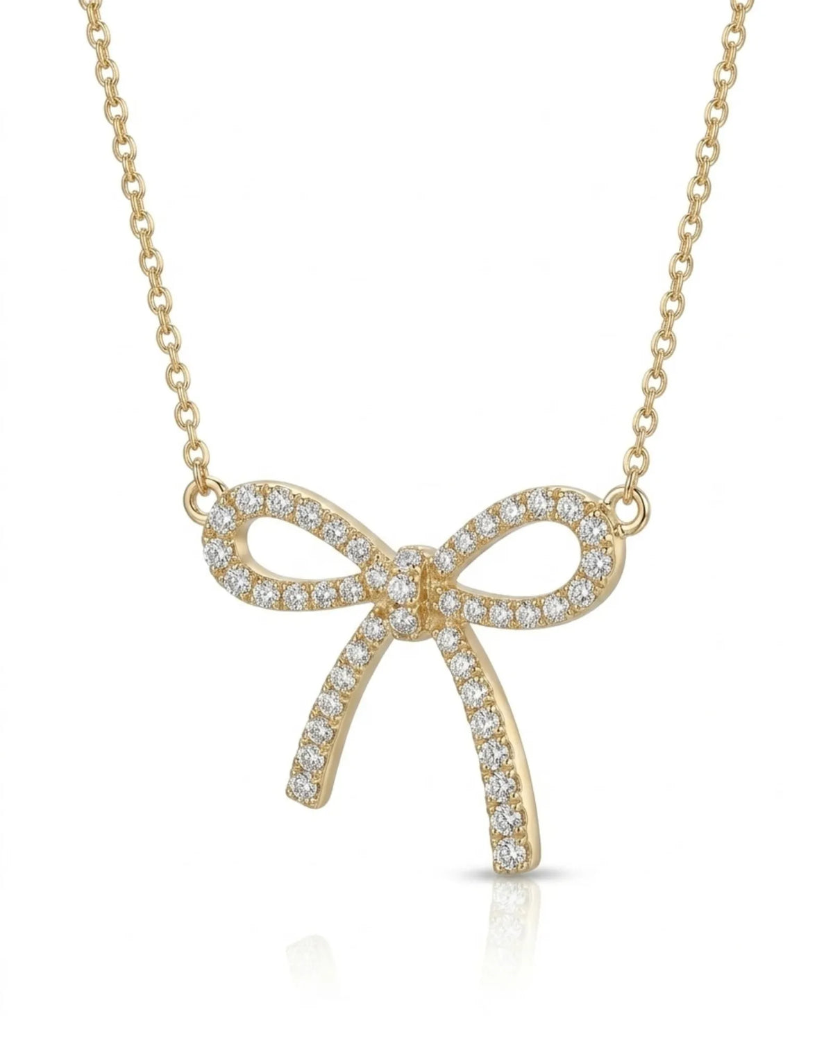 Diamond bow necklace with open ribbon loops and elongated tails in 18K yellow gold | SARATTI