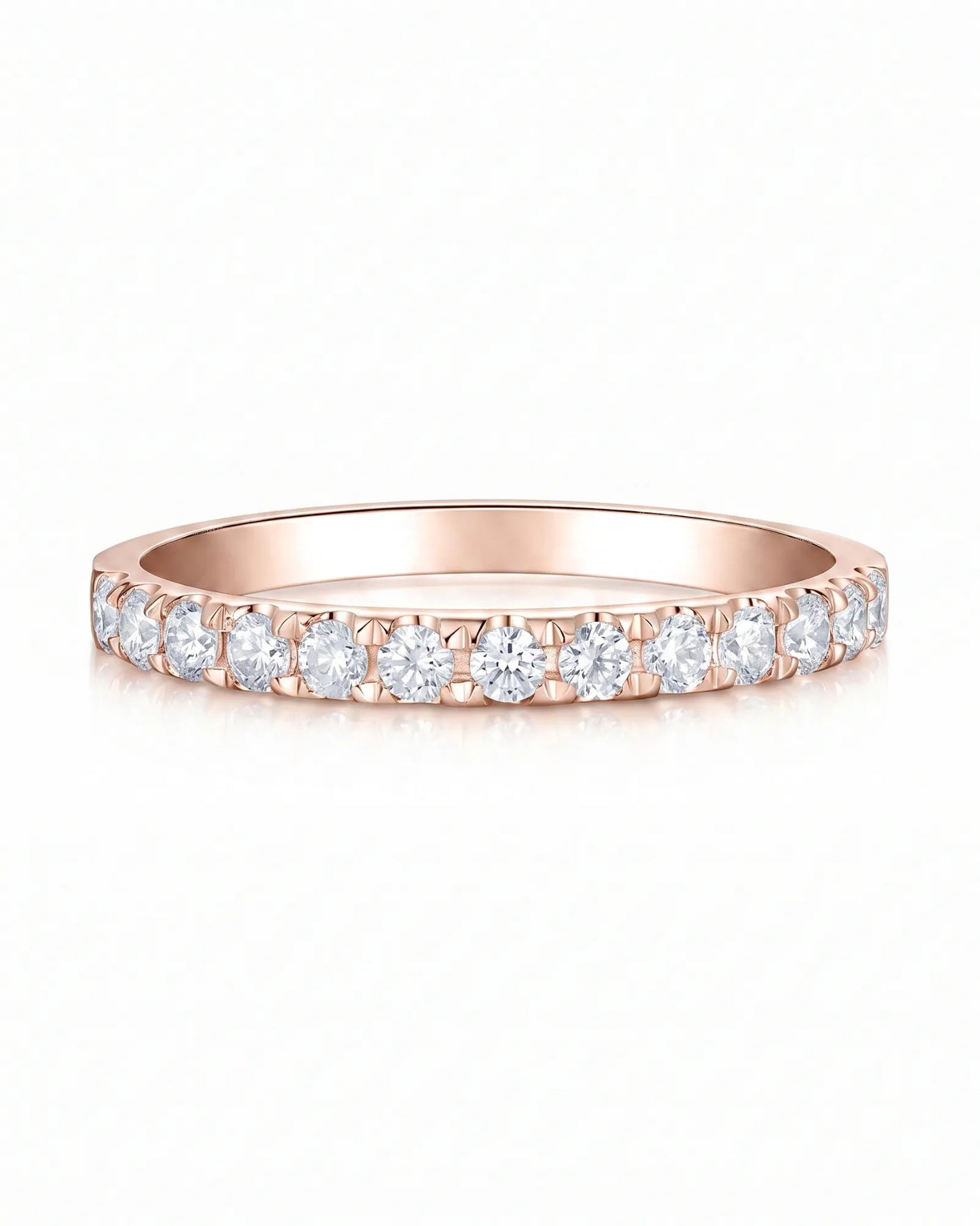 Diamond infinity band highlighting brilliant accent stones across a refined 18K rose gold design | SARATTI