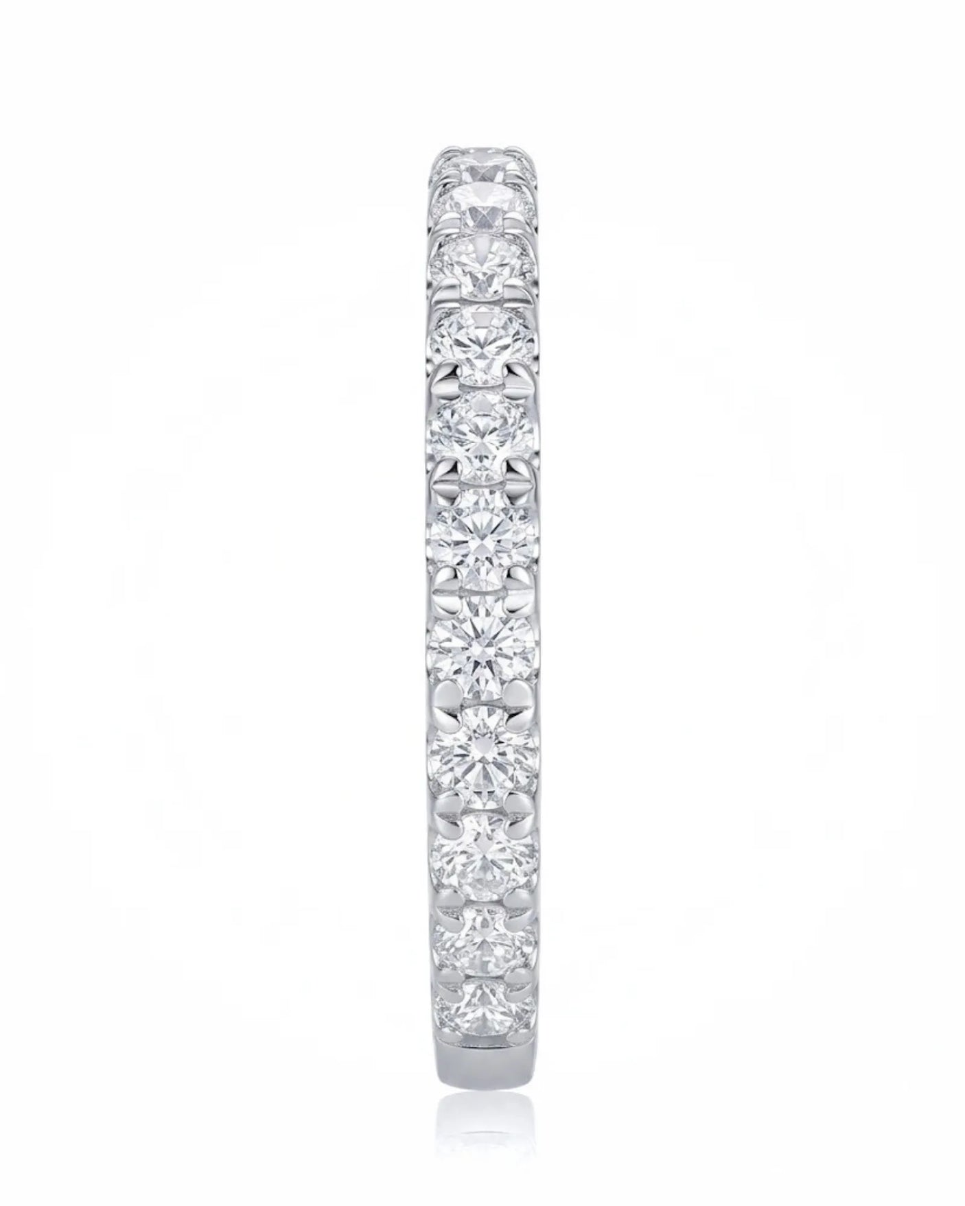 Diamond infinity band highlighting brilliant accent stones across a refined platinum wedding ring design | SARATTI