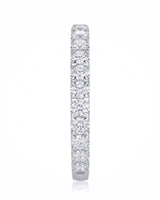 Diamond infinity band highlighting brilliant accent stones across a refined platinum wedding ring design | SARATTI
