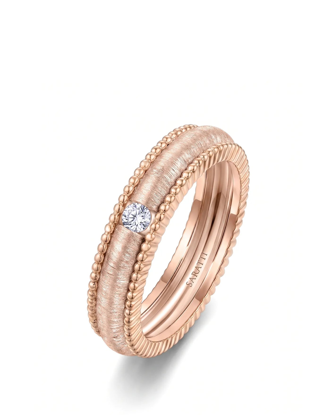 Diamond wedding band with round natural diamond and textured detailing in warm 18K rose gold | SARATTI