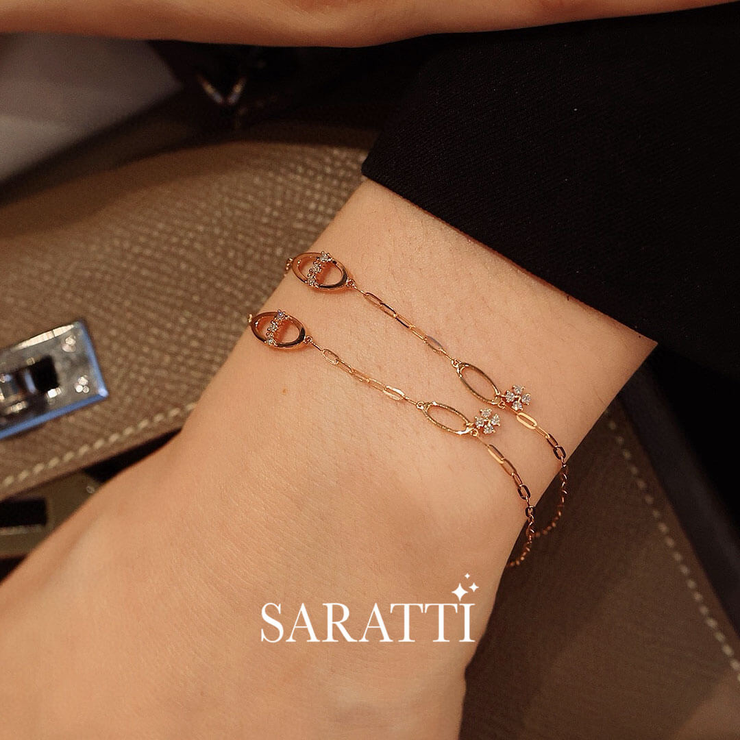 Model wears two Alma Theta Diamond Bracelet for Women | Saratti 
