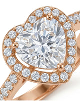 Double-heart moissanite ring with sculpted halo and open gallery in romantic 18K rose gold | SARATTI
