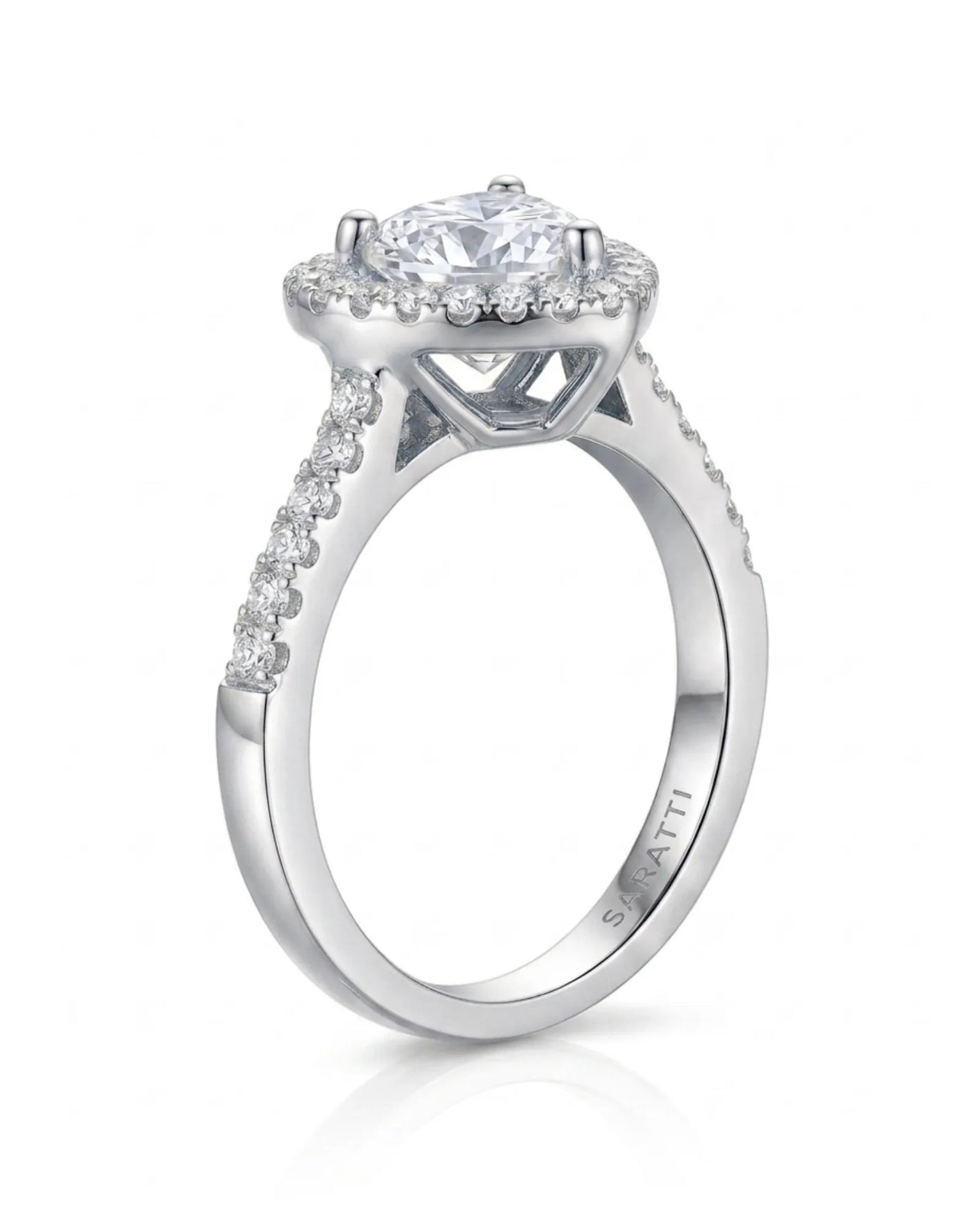 Double-heart moissanite ring with sculpted halo and open symbolic gallery in enduring platinum | SARATTI