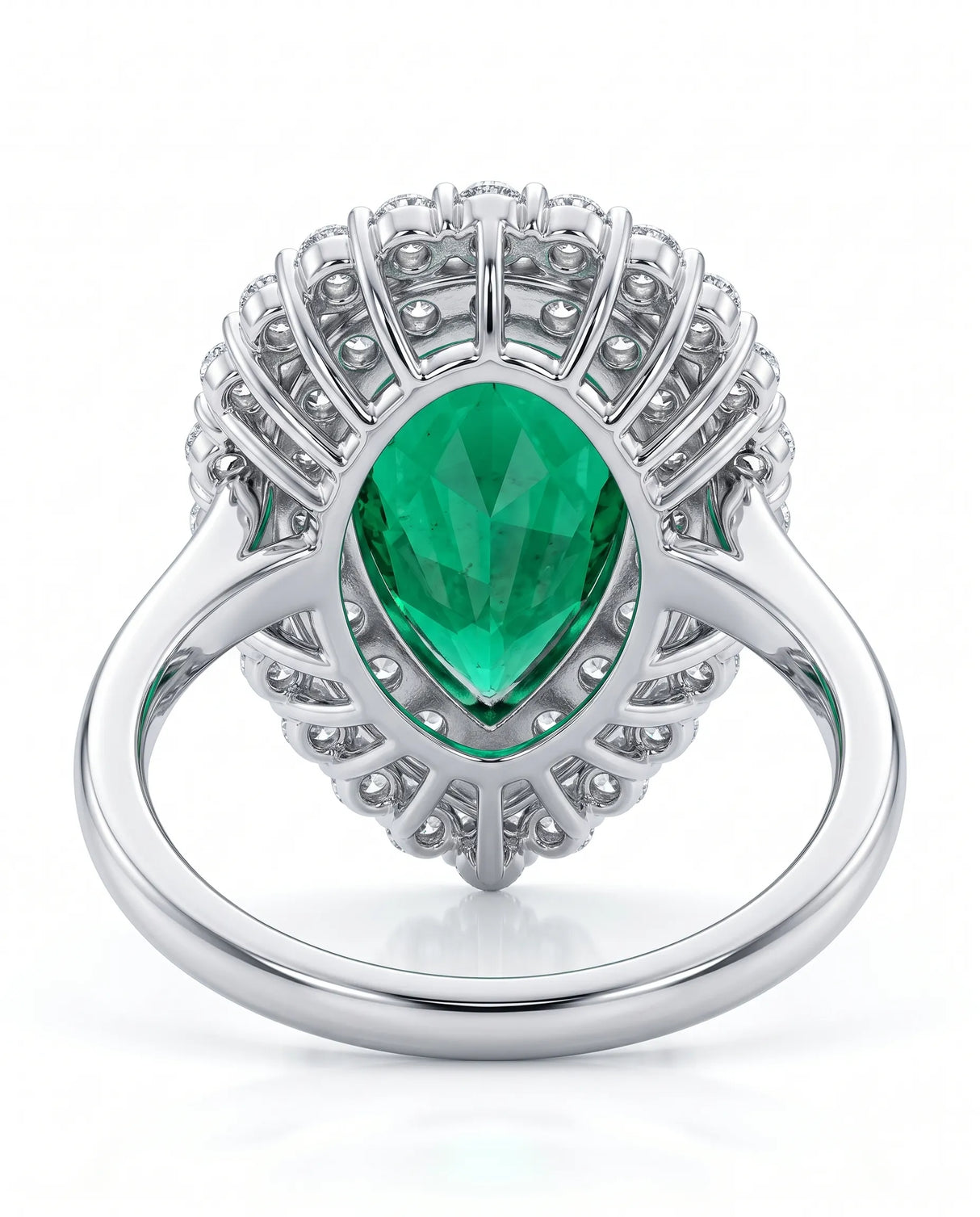 Double halo emerald diamond ring in platinum | SARATTI
