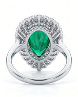 Double halo emerald diamond ring in platinum | SARATTI
