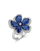 ELARA sapphire diamond flower ring with five blue gemstone petals and diamond-outlined 18K gold setting | SARATTI