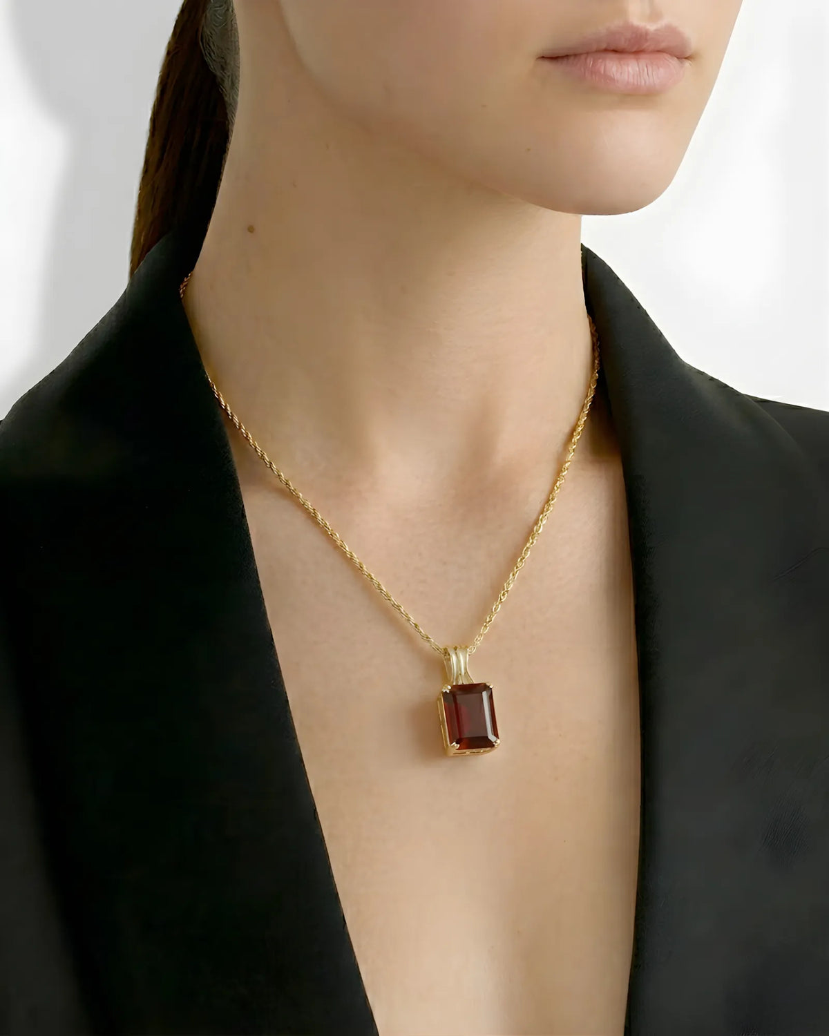 Elegant 18K Yellow Gold garnet necklace featuring emerald-cut natural red gemstone | SARATTI