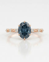 Elegant blue moissanite engagement ring for a distinctive proposal in rose gold | SARATTI