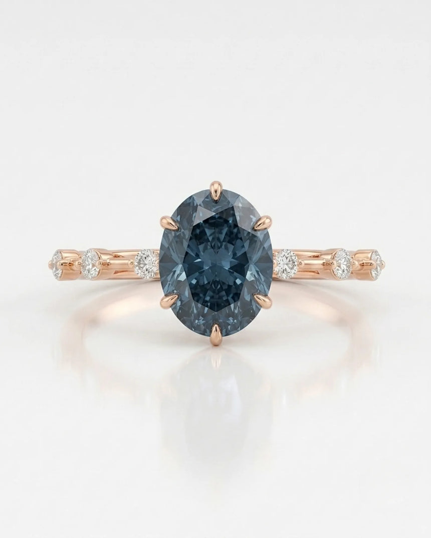 Elegant blue moissanite engagement ring for a distinctive proposal in rose gold | SARATTI