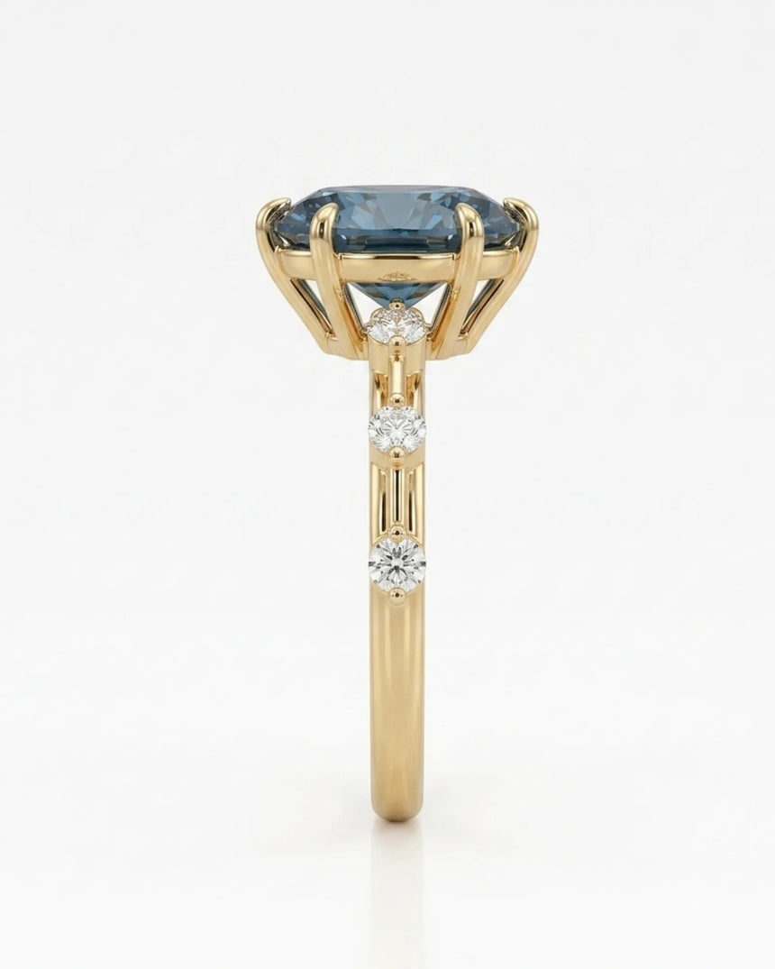 Elegant blue moissanite engagement ring for a distinctive proposal in yellow gold | SARATTI