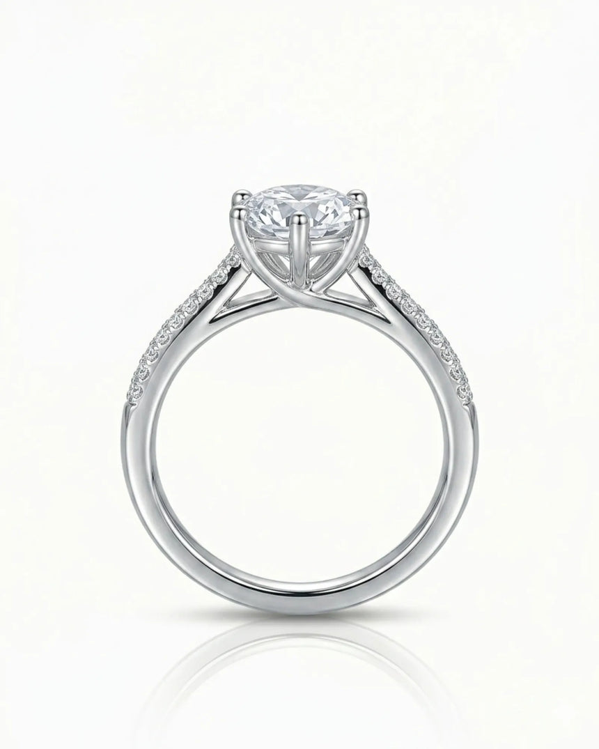 Elegant diamond engagement ring with pavé split shank design in polished 18K white gold | SARATTI