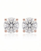 1.00 ct. tw. lab-grown round diamond four-prong studs in 14K rose gold, side profile | SARATTI