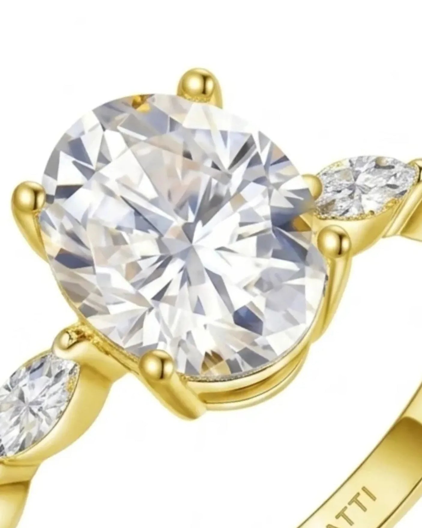 Elegant oval moissanite proposal ring with symmetrical marquise shoulders crafted in 18K yellow gold | SARATTI