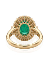 Elegant oval natural emerald ring with diamond shoulders in 18K yellow gold | SARATTI