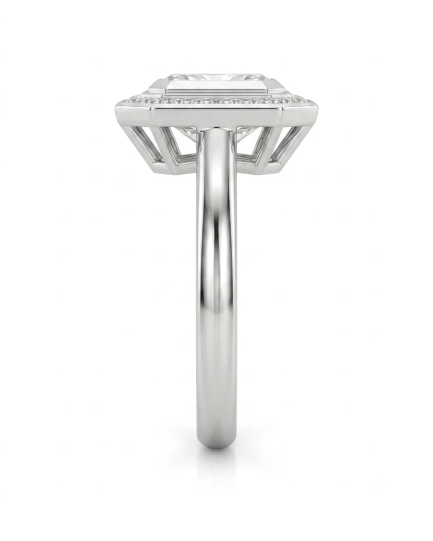 Elegant radiant moissanite bezel ring with clipped-corner halo in 18K white gold | SARATTI