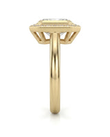 Elegant radiant moissanite bezel ring with clipped-corner halo in 18K yellow gold | SARATTI